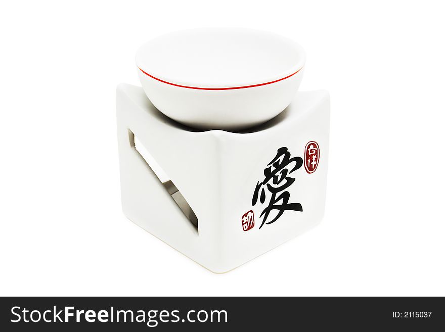 Japanese ceramic lamp for aromatherapy on a white background. Japanese ceramic lamp for aromatherapy on a white background