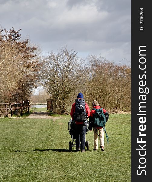 Family Walking In A Park