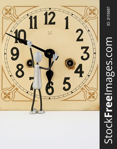 figure repairs antique beige clock. figure repairs antique beige clock