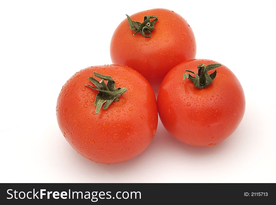Tomatos on the white background