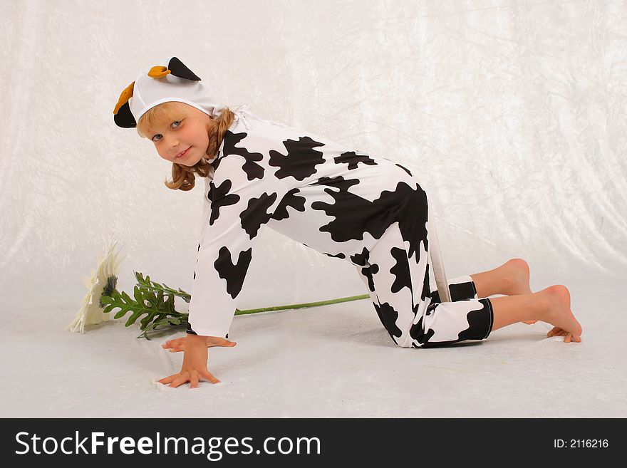 The girl in a fancy dress of the cow