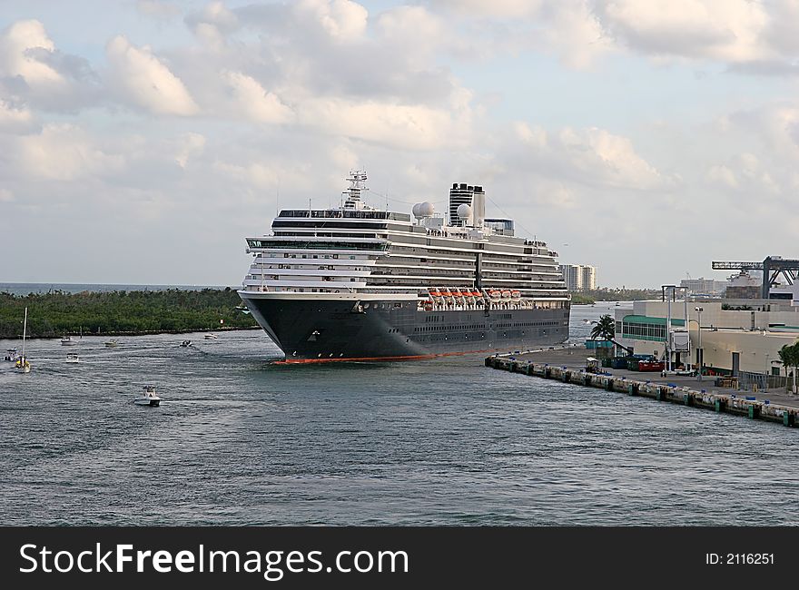 A cruise ship at a dock in port