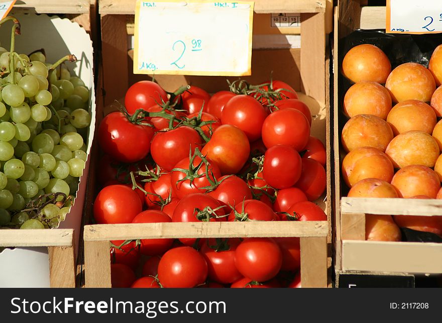 Tomatoes for sale on display