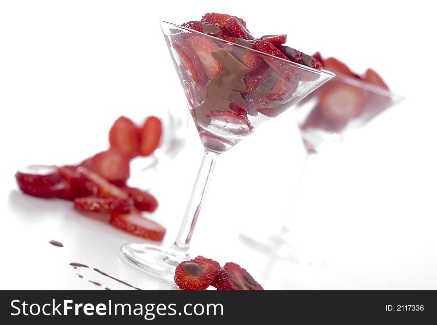 Red beautiful strawberry on the glass