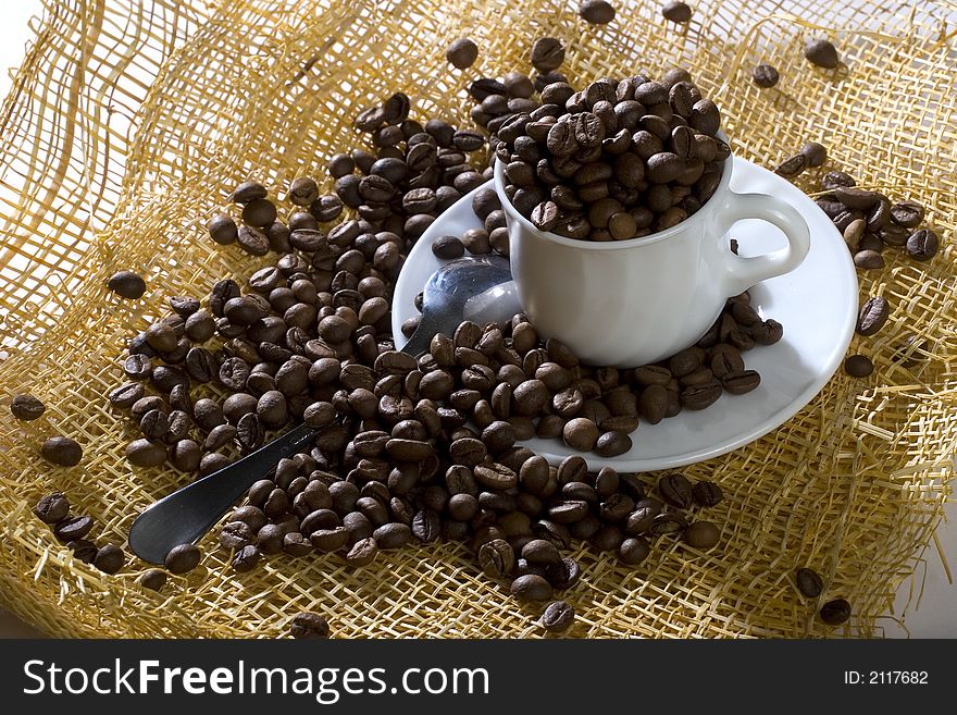 A photo of cup of coffee beans. A photo of cup of coffee beans