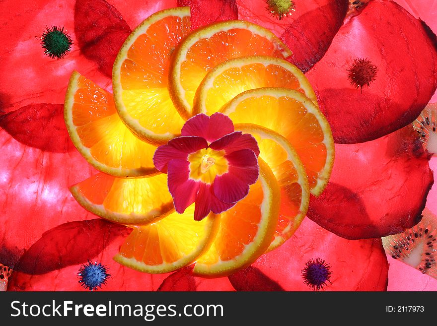 Arrangement of slices of beetroot and oranges with a flower in the center. Arrangement of slices of beetroot and oranges with a flower in the center.