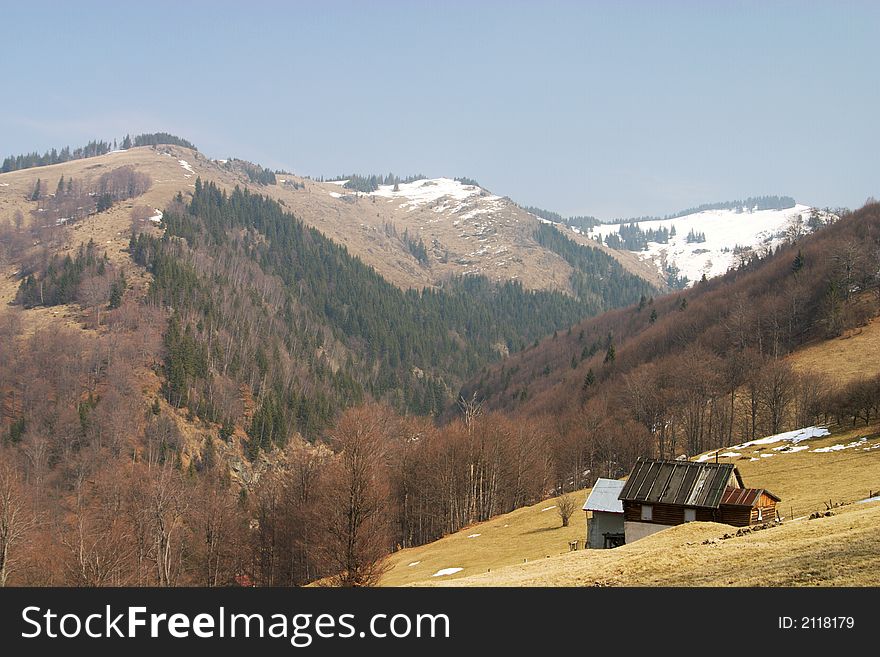 Mountain landscape with isolated houses on romanian mountains