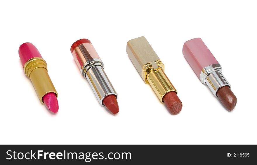 Four multicolored lipstick, isolated on white background