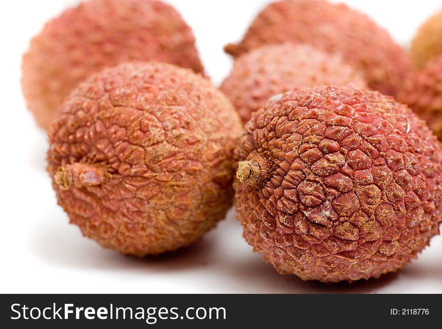 Closeup of litchies isolated on white