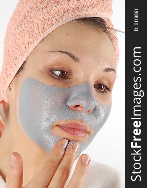 Attractive woman with facial mask. Attractive woman with facial mask