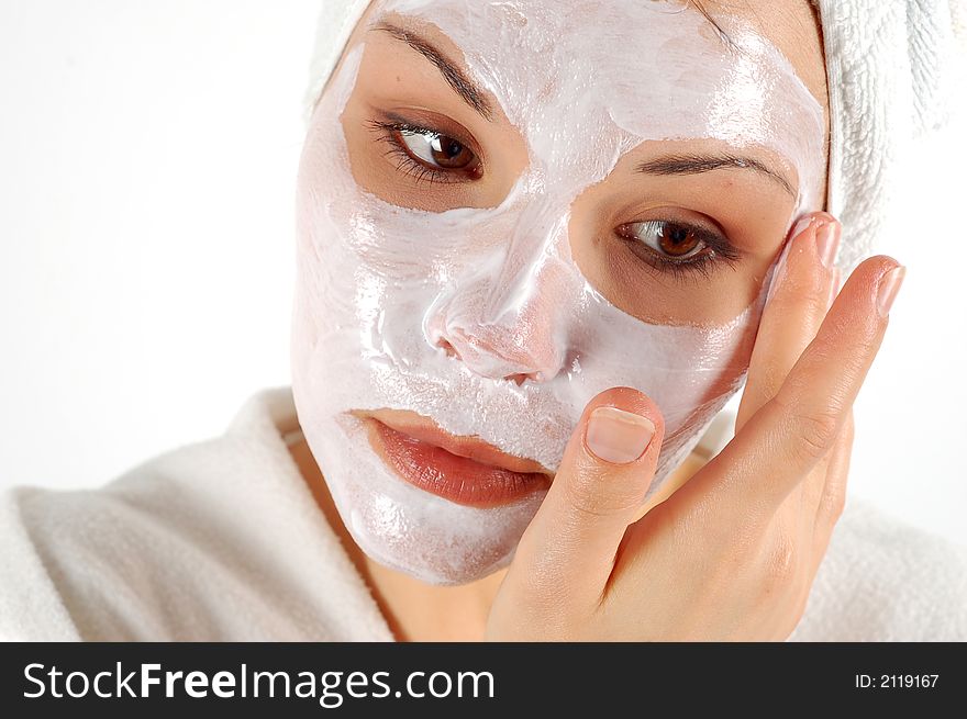 Attractive woman with facial mask. Attractive woman with facial mask