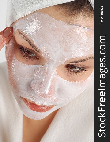 Attractive woman with facial mask. Attractive woman with facial mask