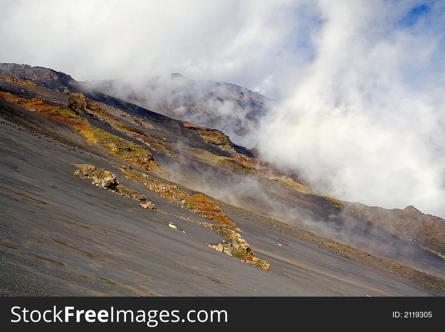 The Etna landscape, volcanic rocks and grass