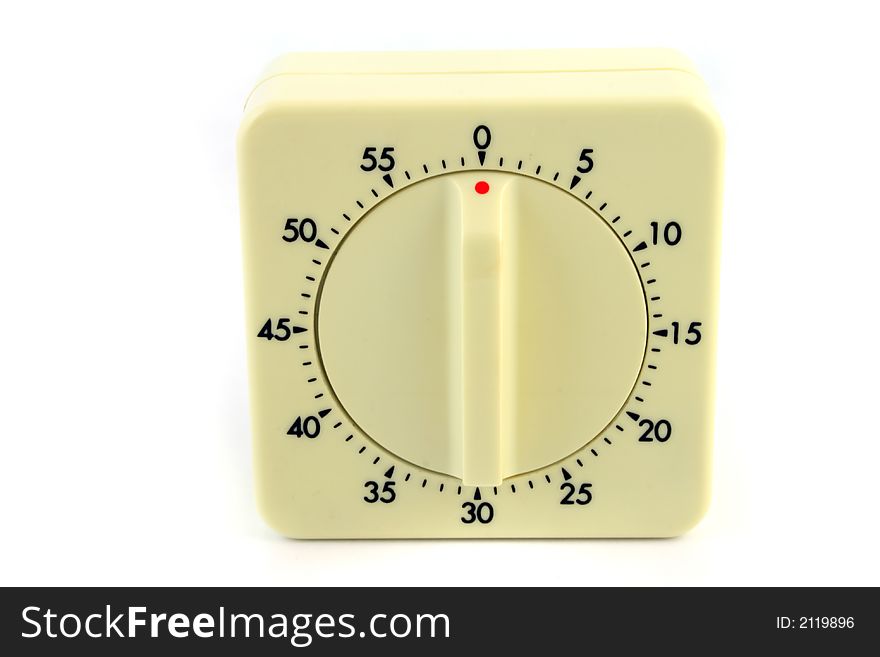 Close up of a wind up timer isolated on a white background. Close up of a wind up timer isolated on a white background