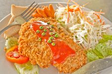 Fried Fish And Vegetables Salad Stock Images