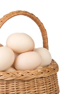 Eggs And Basket On White Stock Photos Eggs And Basket On White Stock Photos