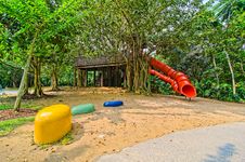 Red Colorful Slide Treehouse Garden Play Area Stock Photography
