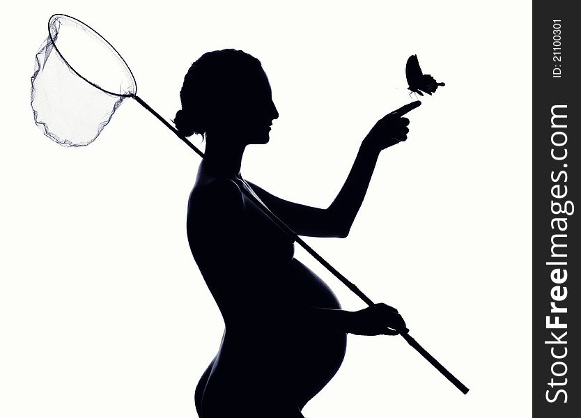 Pregnant woman with a butterfly net