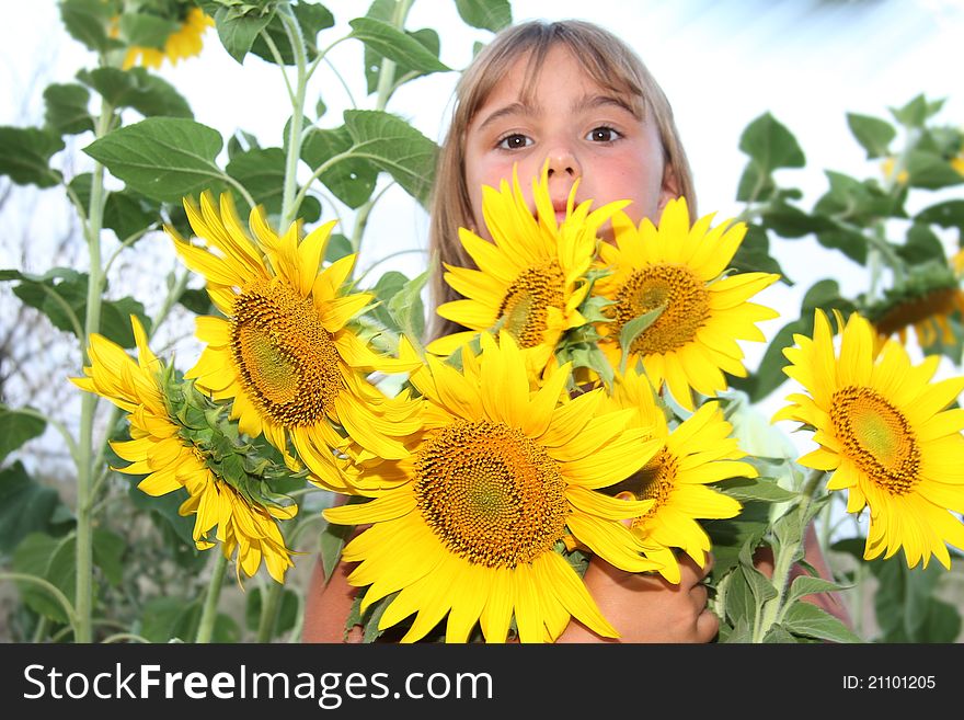 Cute child with flowers outdoors. Cute child with flowers outdoors