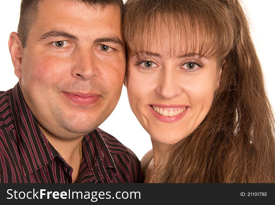 Portrait of an adult couple on a white. Portrait of an adult couple on a white
