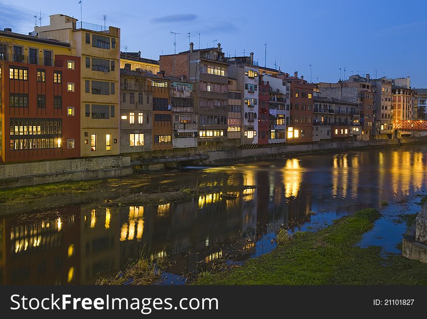 Twilight view of the Onyar River in Girona. Catalonia. Twilight view of the Onyar River in Girona. Catalonia.