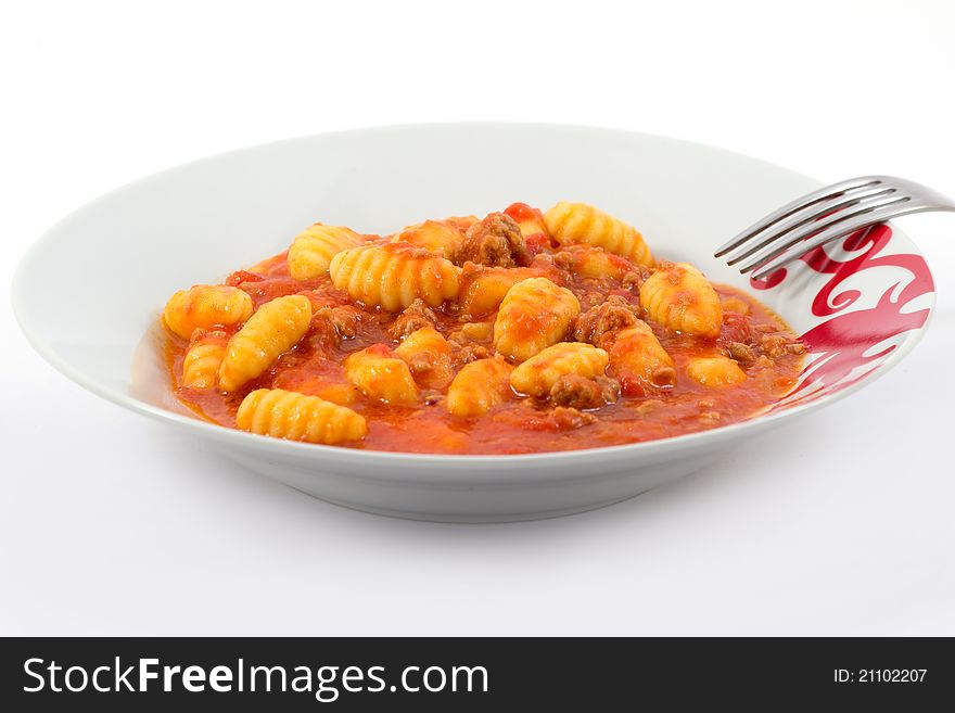 Potato gnocchi with tomato sauce with minced meat