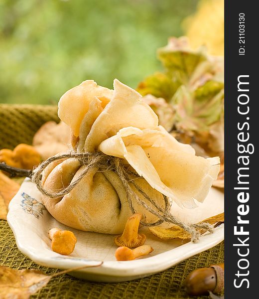 Pancake bag with mushrooms. Selective focus