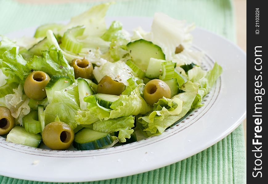 Fresh vegetable salad with olive. Selective focus