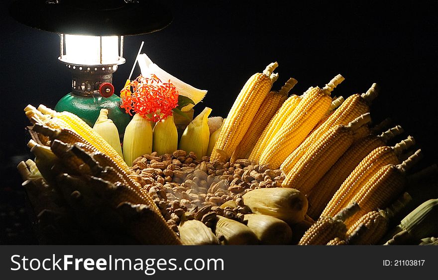 Corn and peanuts on sale by a street vendor in Bali