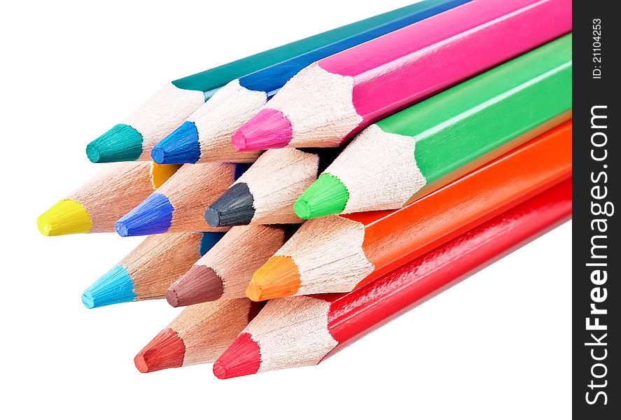 Colored pencils close-up on white background