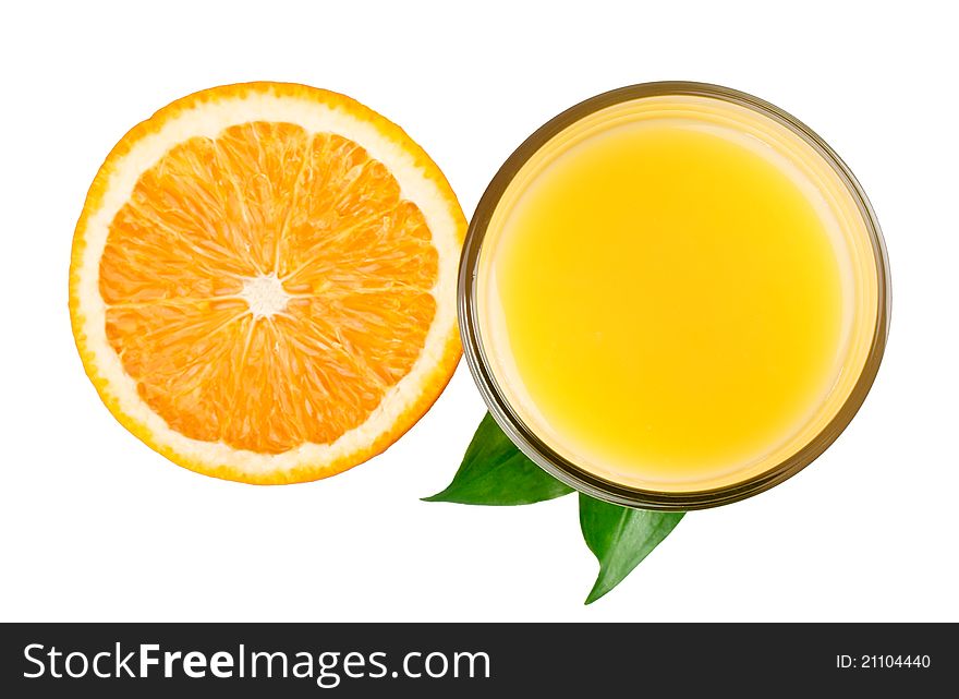 Half orange and juice with leaves from top on white background
