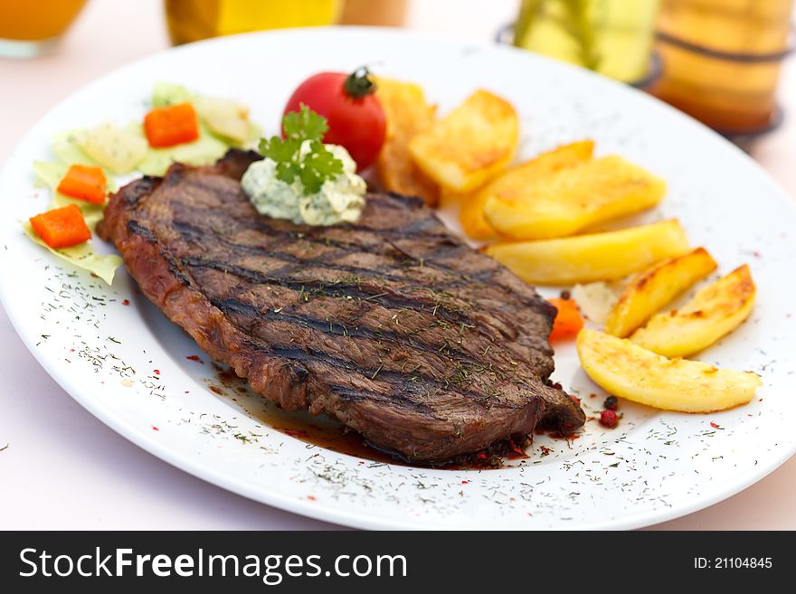 Grilled,New York Strip Steak with Vegetables.