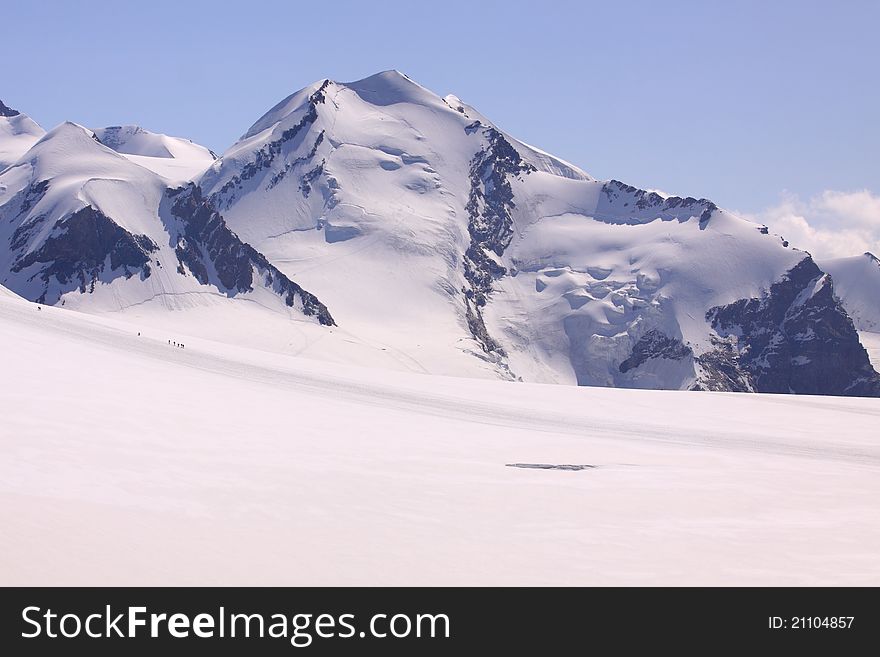 The snow covered mountain Breithorn seen from the Klein Mattehorn. The snow covered mountain Breithorn seen from the Klein Mattehorn.