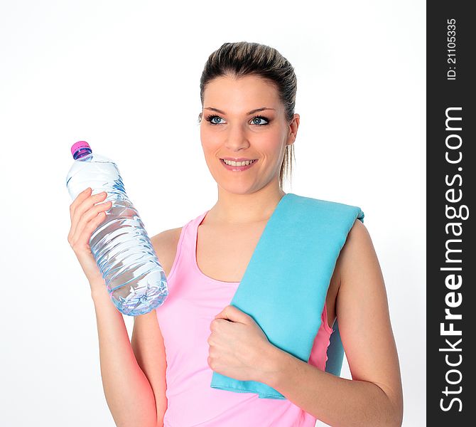 Young woman holding a bottle of water. Young woman holding a bottle of water