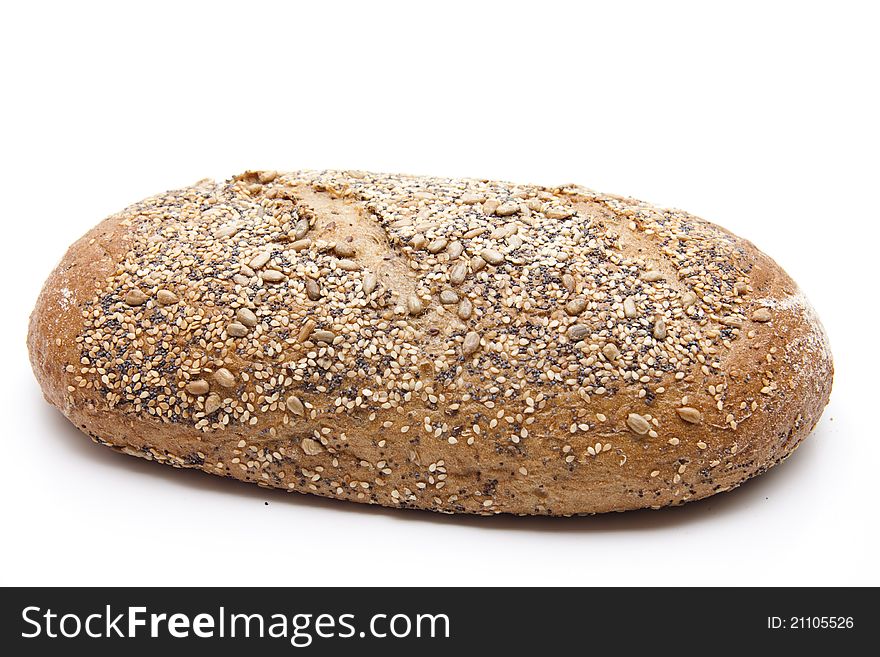 More grain bread baked and on white background