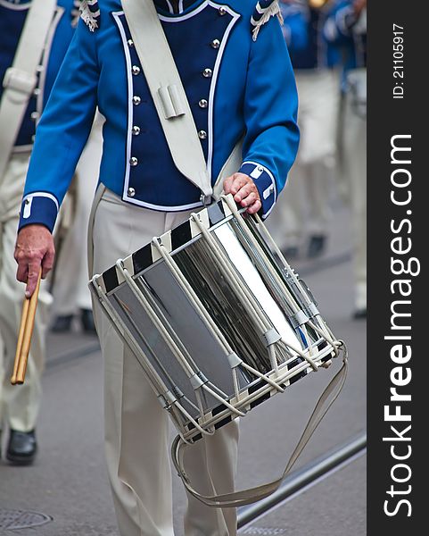 Musician with a drum on the parade