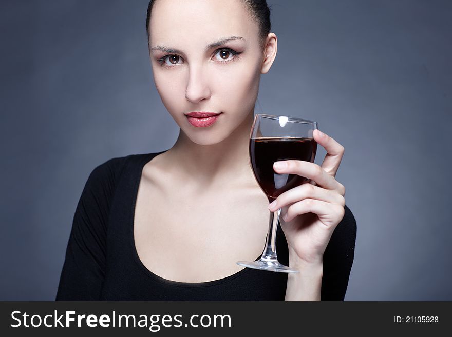 Portrait Of Beautiful Woman With Glass
