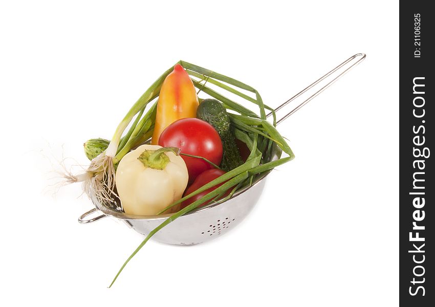 Vegetables in a sieve