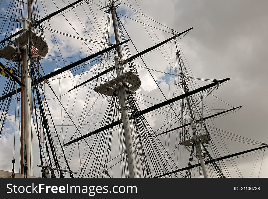 Details of tall mast and rigging of a large sailing boat. Details of tall mast and rigging of a large sailing boat.