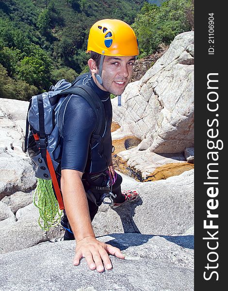 Men preparing to rappeling on waterfall. Men preparing to rappeling on waterfall