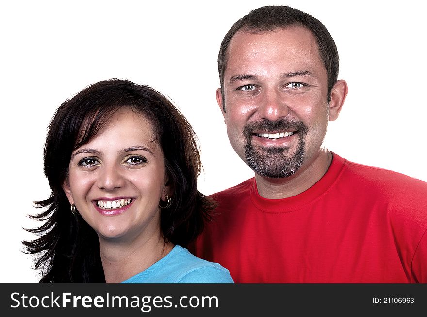 Closeup portrait of a sweet young couple smiling together