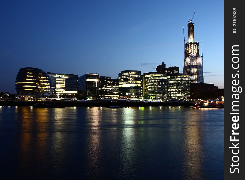 A London view across the Thames at night. A London view across the Thames at night