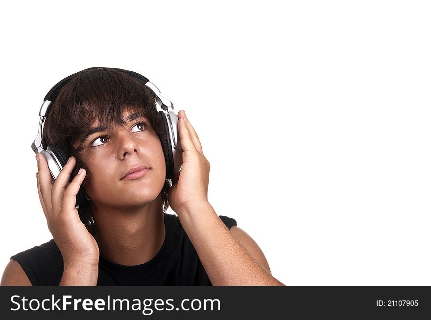 Young boy listening to music with headphones