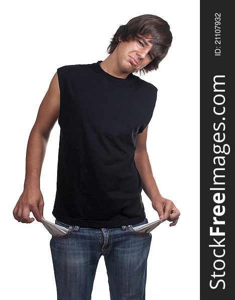 Teen showing his empty pockets on white background