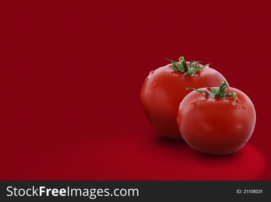 Two tomatoes on red background