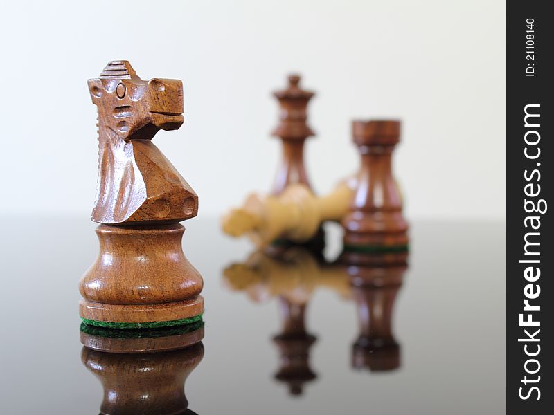 Chess scene with knight in the front. Chess scene with knight in the front.