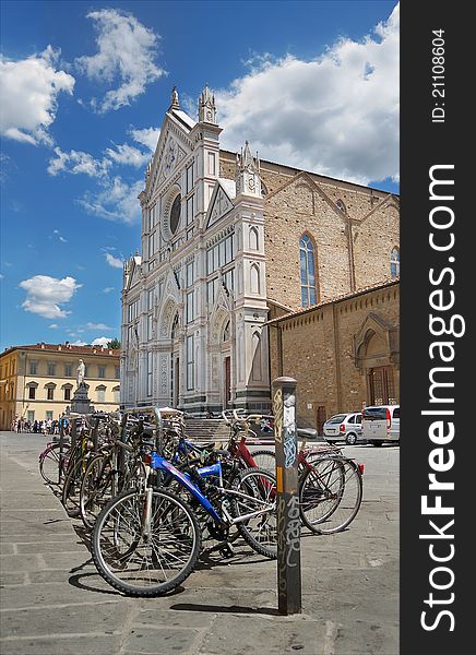 Bicycle parking in front of Basilica Santa Croce (Basilica of the Holy Cross) in Florence, Italia. Bicycle parking in front of Basilica Santa Croce (Basilica of the Holy Cross) in Florence, Italia.