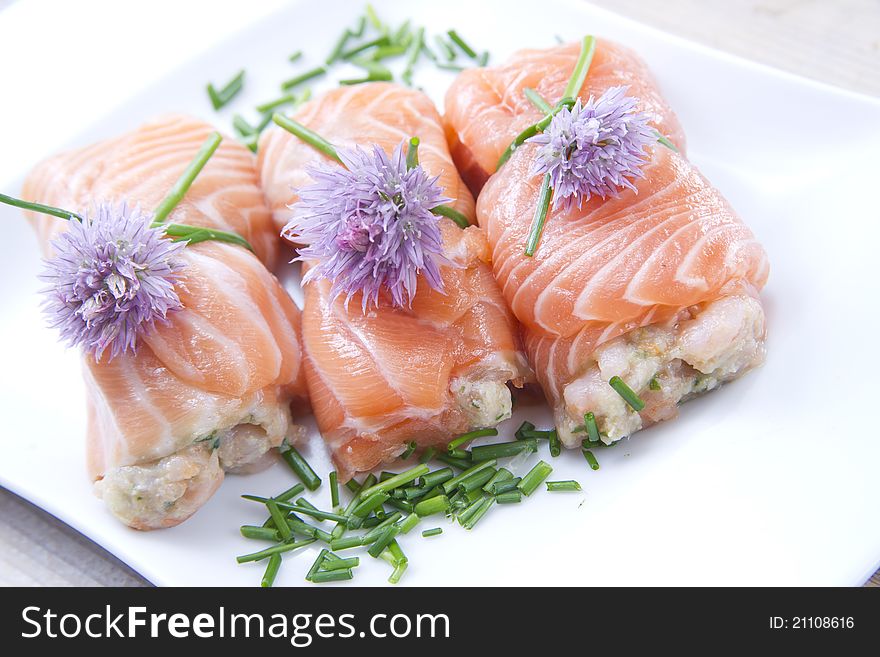 Mediterranean diet, main course, rolls of raw salmon. Mediterranean diet, main course, rolls of raw salmon