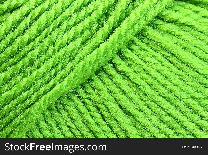 A texture of green yarn. A texture of green yarn