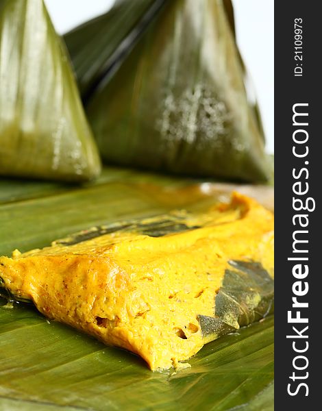 Steamed curry pudding with fish and coconut